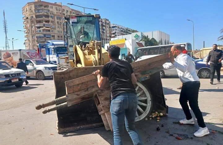 استعادة الانضباط للشوارع والميادين بحى الضواحى ببورسعيد